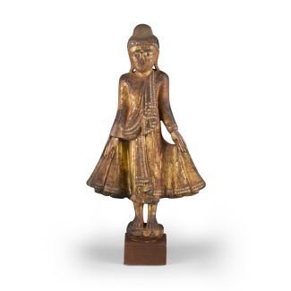 Ein stehender Buddha aus goldlackiertem Holz