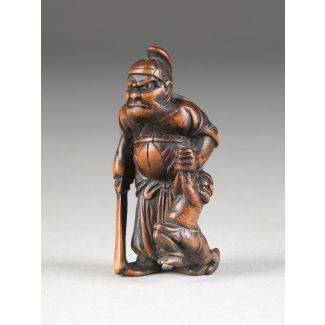 Ein netsuke von shoki und oni aus holz