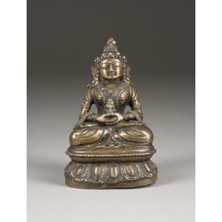 Eine sitzende figur des amitayus aus bronze