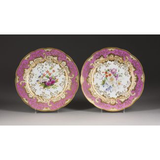 TWO PORCELAIN PLATES WITH FLORAL DECOR 