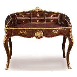 Burl Wood Desk with Elaborate Gilt Bronze Mounts, Shell Crest and Floral Basket Motif