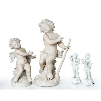Lot of Four Classical Biscuit Figures of Putti in Varying Sizes