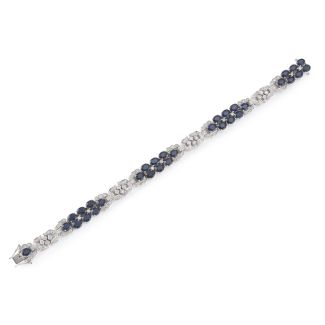 Bracelet of oval-cut sapphires and diamonds with geometric motifs