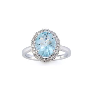 Ring with central oval-cut aquamarine surrounded by diamonds