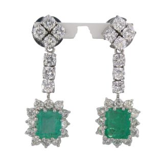 White gold drop earrings set with emerald