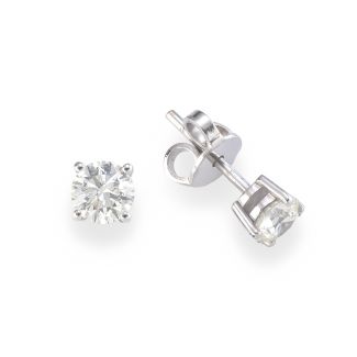 Four-prong diamond earrings in white gold