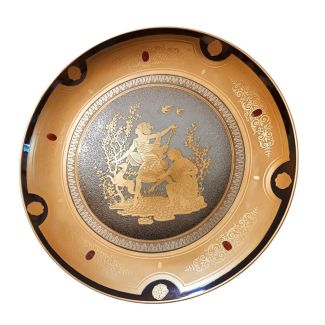Collectible porcelain plates part of the "Four Seasons" series