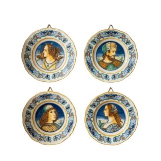 4 majolica plates with Renaissance-inspired decorations